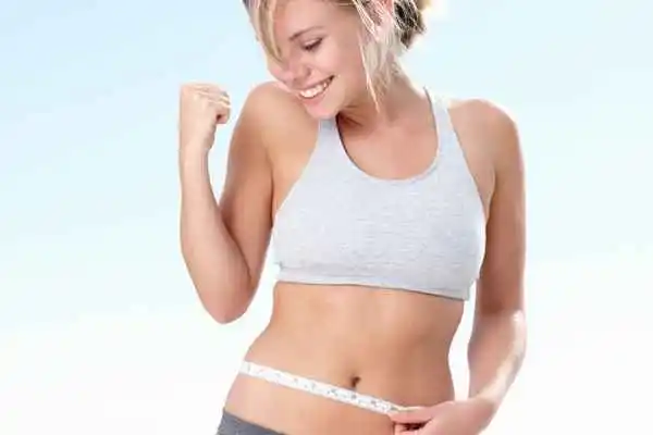 woman happy after fat reduction treatment Southall